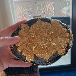 Absolutely stunning jewelry box , golden and black top, made in UAE. Must have!